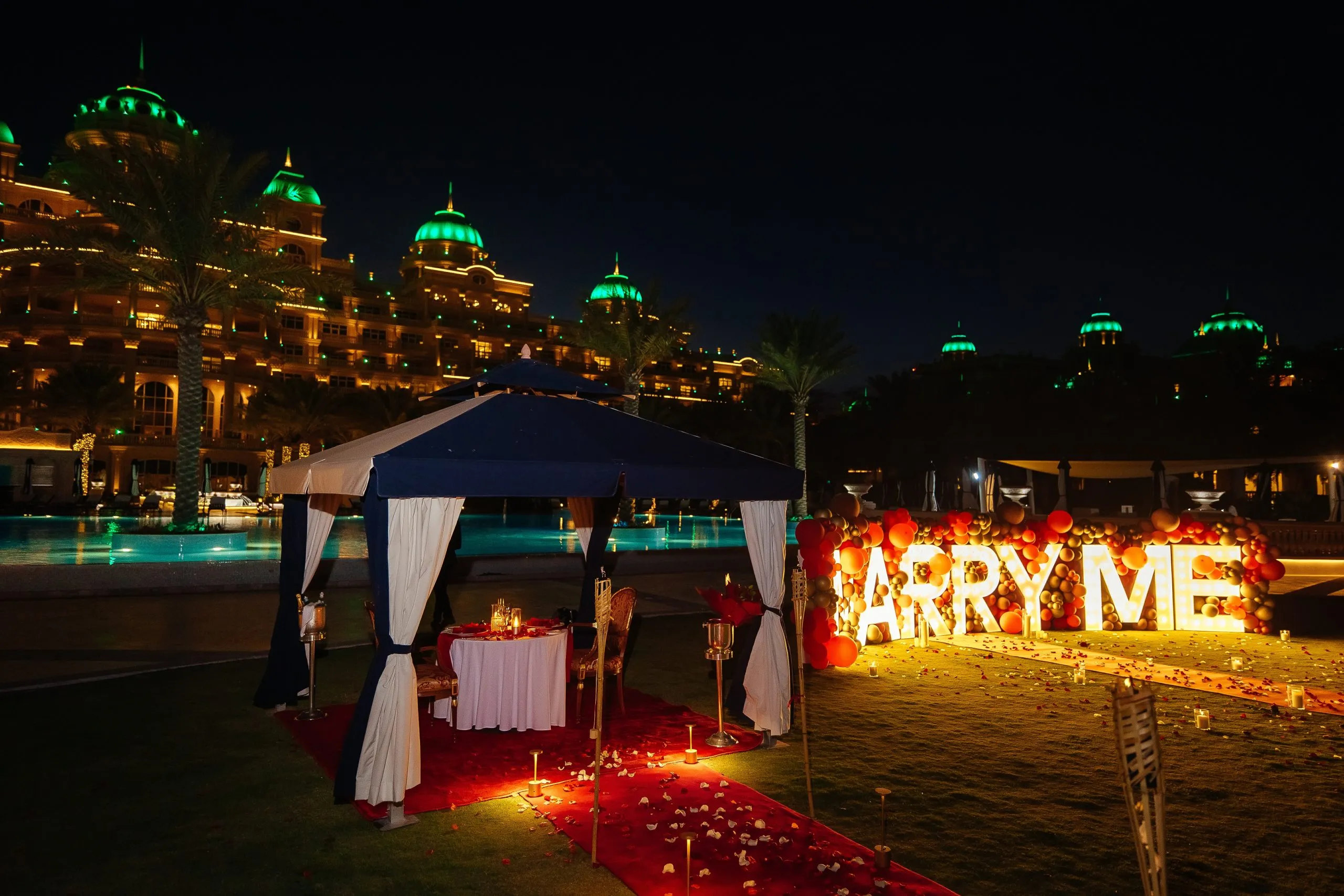 Stunning illuminated LOVE letters with LED lights at elegant Dubai wedding venue creating perfect photo backdrop